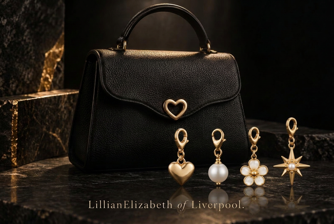 The Elizabeth Bag with the Golden Heart, Pearl Drop, Pearl Flower and Pearl Star charms, signed LillianElizabeth of Liverpool